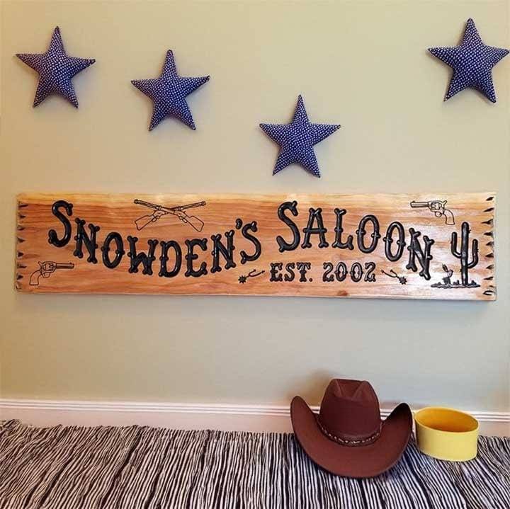 Saloon Sign w Rifles Pistols and Spurs