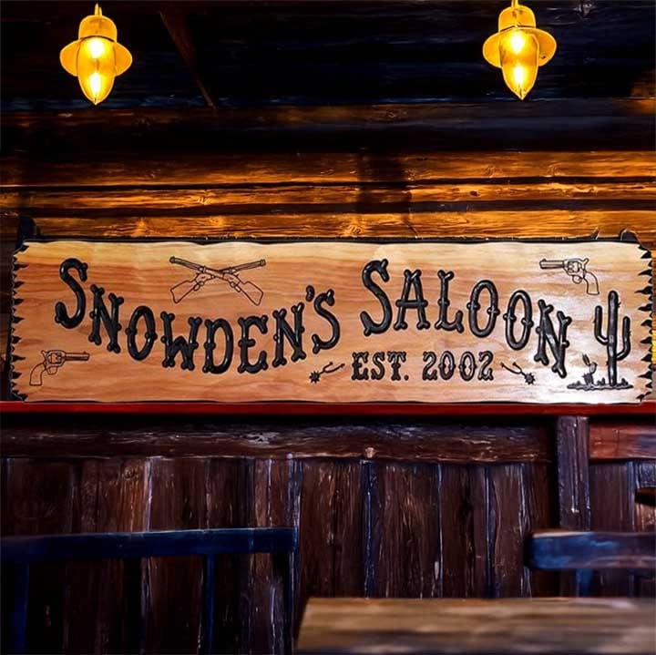 Saloon Sign w Rifles Pistols and Spurs